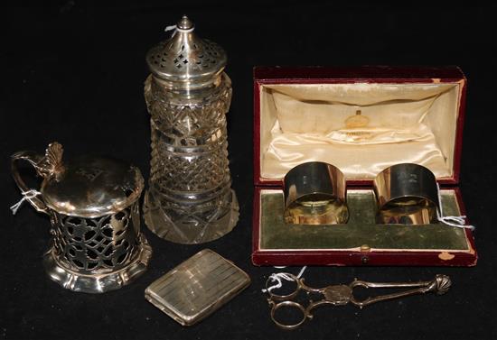 A pair of Georgian shell-bowl sugar nips, a pair of cased silver napkin rings, a vesta case and sundries